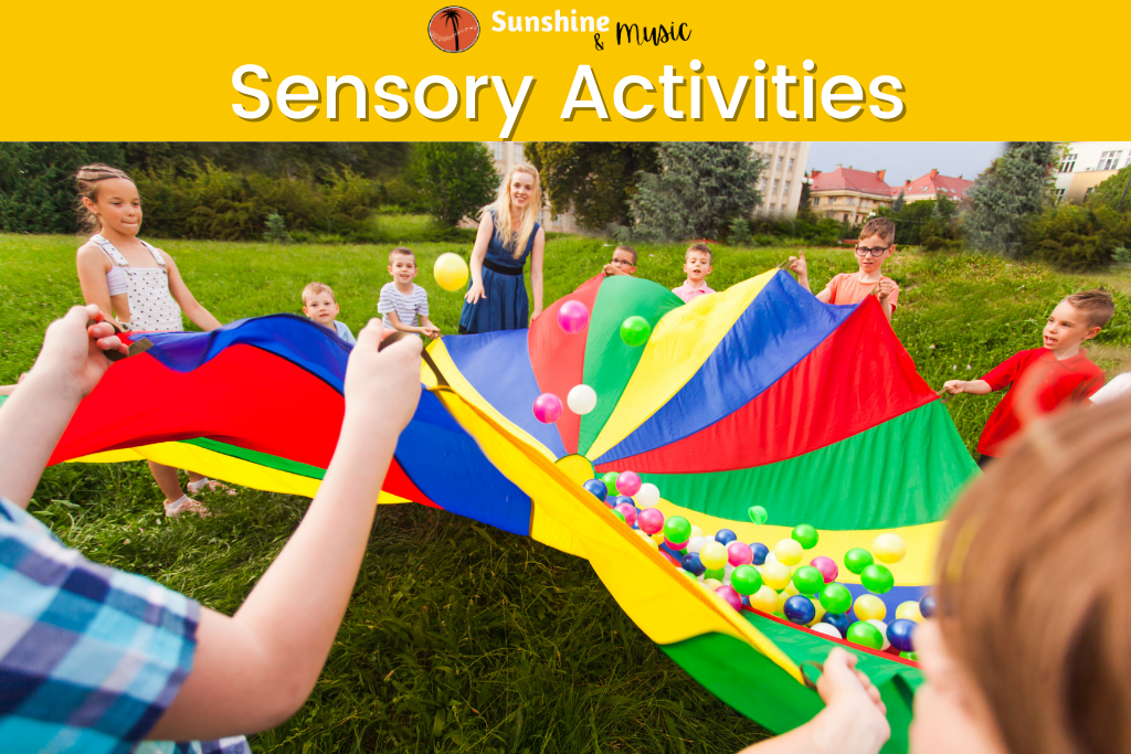 picture of students with a parachute and balls entitled sensory activities